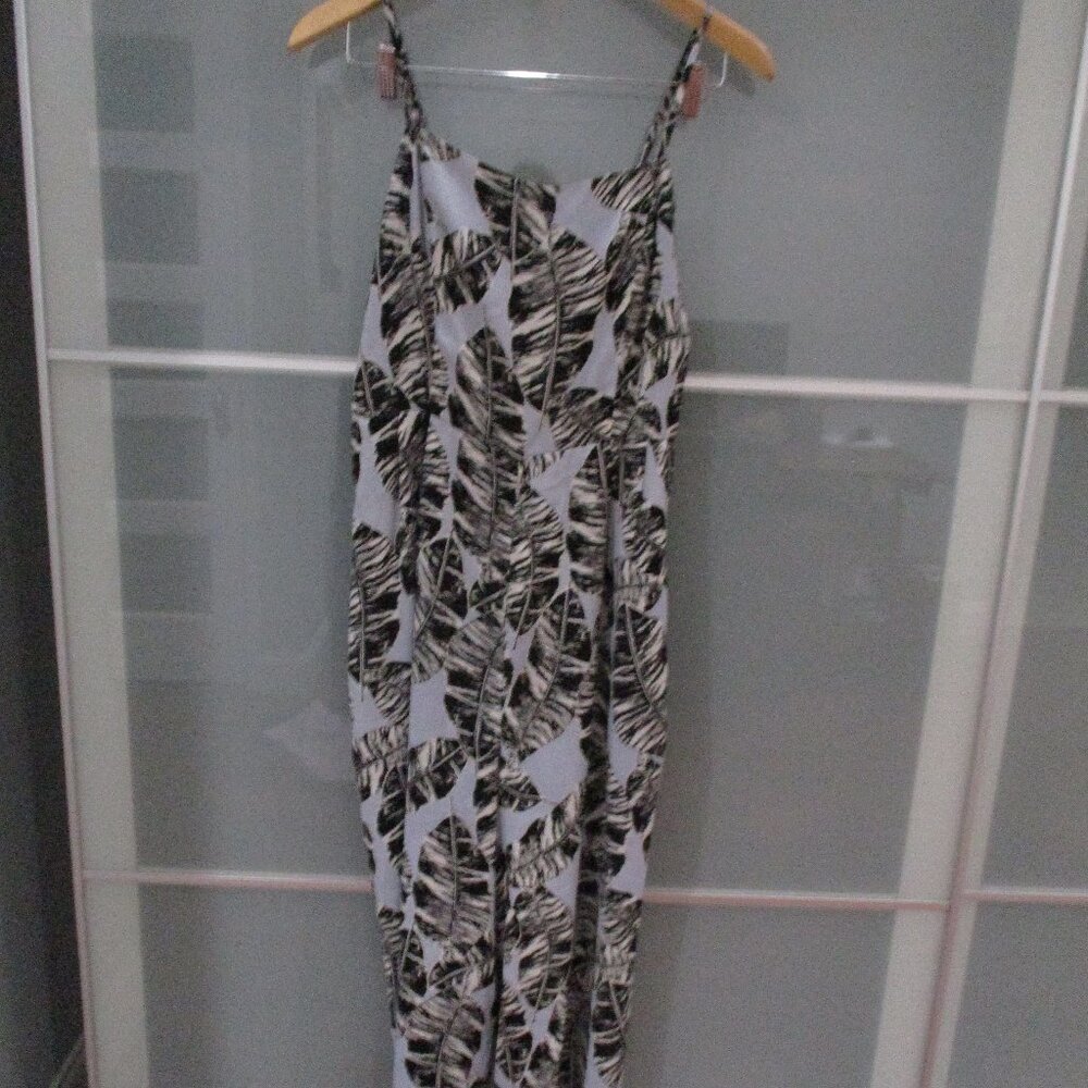 Olive + Oak Wide Leg Spaghetti Strap Cut Out Back Jumpsuit Romper